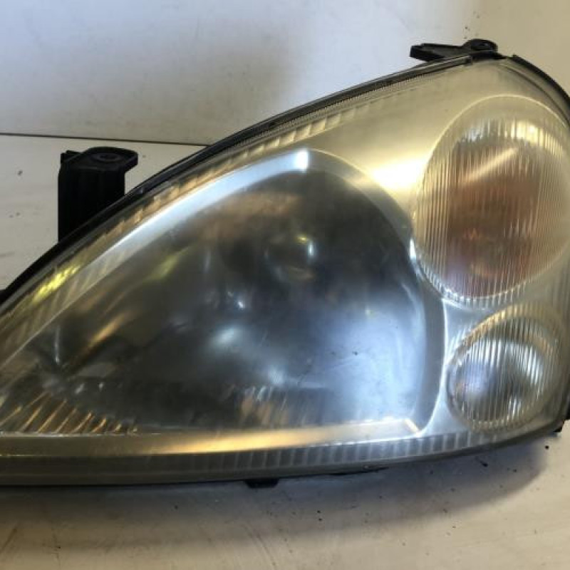 Optique avant principal gauche (feux)(phare) SUZUKI LIANA