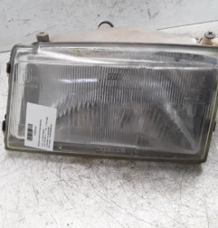 Optique avant principal gauche (feux)(phare) FIAT UNO Photo n°1