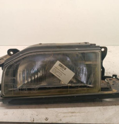 Optique avant principal gauche (feux)(phare) MAZDA 323 3 Photo n°1