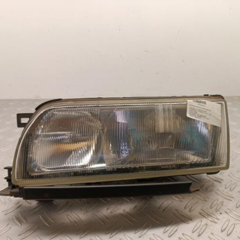 Optique avant principal gauche (feux)(phare) NISSAN PRIMERA 1