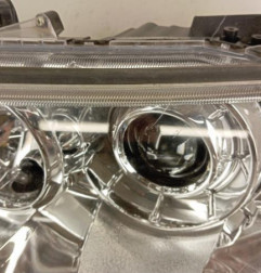 Optique avant principal gauche (feux)(phare) MITSUBISHI L 200 3 Photo n°1