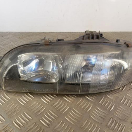 Optique avant principal gauche (feux)(phare) FIAT BRAVA Photo n°1