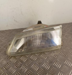 Optique avant principal gauche (feux)(phare) PEUGEOT 106 Photo n°1