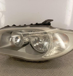 Optique avant principal gauche (feux)(phare) BMW SERIE 1 E87 Photo n°1