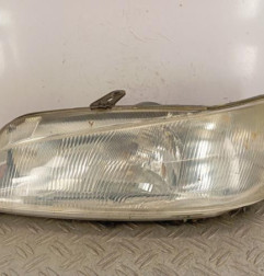 Optique avant principal gauche (feux)(phare) PEUGEOT 306 Photo n°1