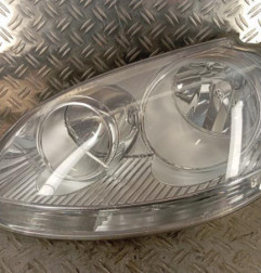 Optique avant principal gauche (feux)(phare) VOLKSWAGEN GOLF 5 Photo n°1