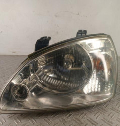 Optique avant principal gauche (feux)(phare) KIA CARENS 2 Photo n°1