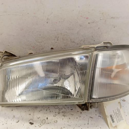 Optique avant principal gauche (feux)(phare) MAZDA DEMIO Photo n°1