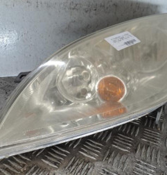 Optique avant principal gauche (feux)(phare) MITSUBISHI COLT 6 Photo n°1