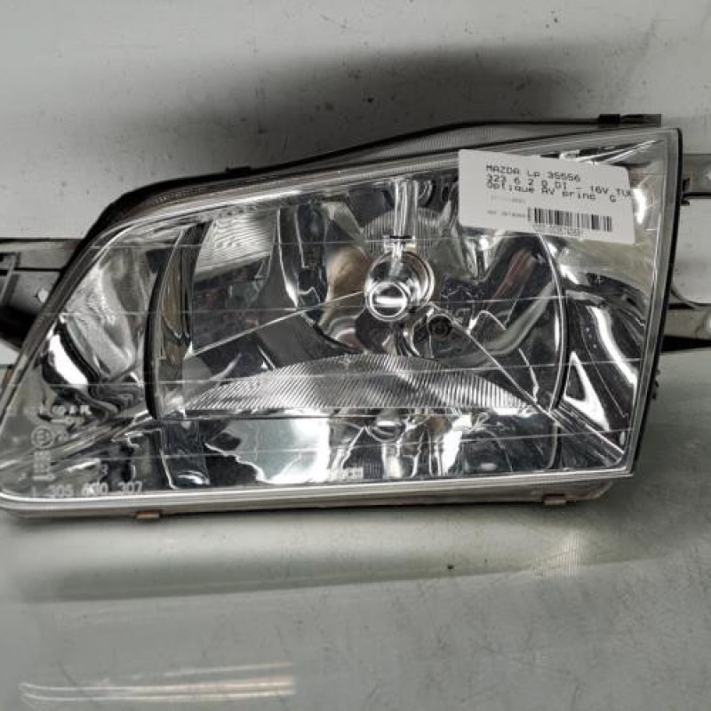 Optique avant principal gauche (feux)(phare) MAZDA 323 6