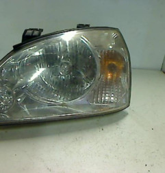 Optique avant principal gauche (feux)(phare) KIA CARENS 2 Photo n°1