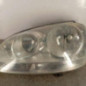 Optique avant principal gauche (feux)(phare) VOLKSWAGEN GOLF 5
