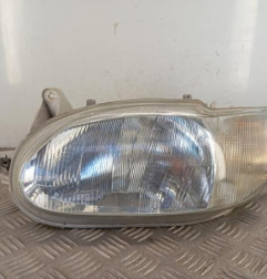 Optique avant principal gauche (feux)(phare) FORD ESCORT 6 Photo n°1