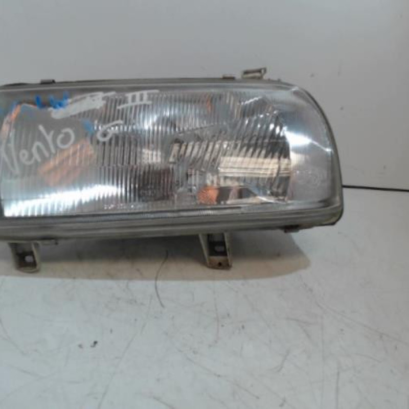 Optique avant principal gauche (feux)(phare) VOLKSWAGEN VENTO