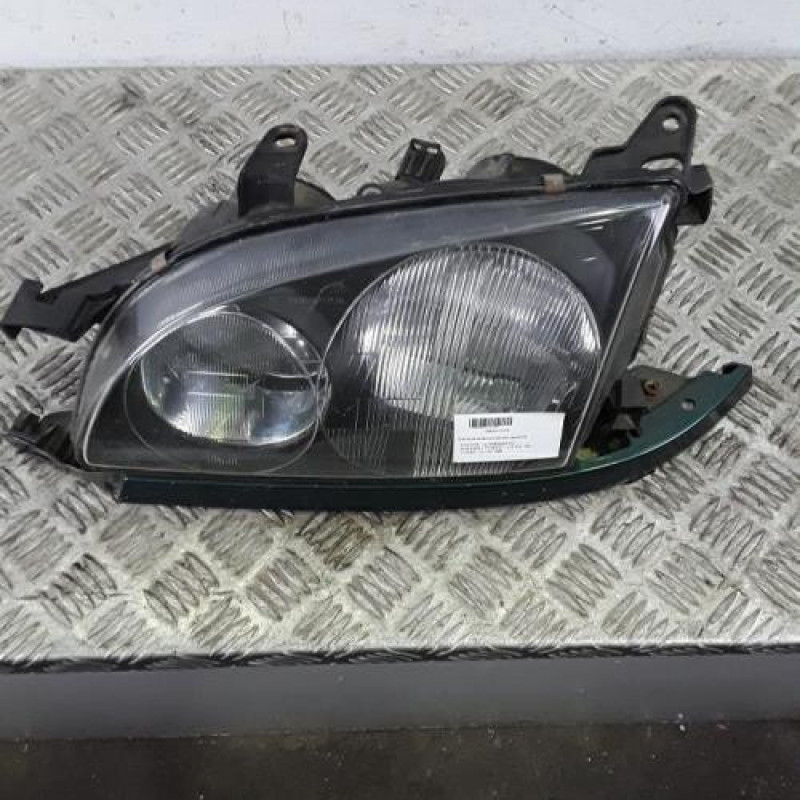 Optique avant principal gauche (feux)(phare) TOYOTA AVENSIS 1