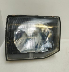 Optique avant principal gauche (feux)(phare) MITSUBISHI PAJERO 2 Photo n°1