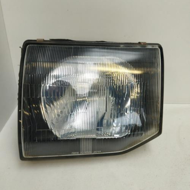Optique avant principal gauche (feux)(phare) MITSUBISHI PAJERO 2