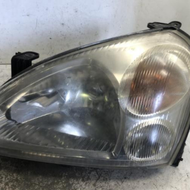 Optique avant principal gauche (feux)(phare) SUZUKI LIANA
